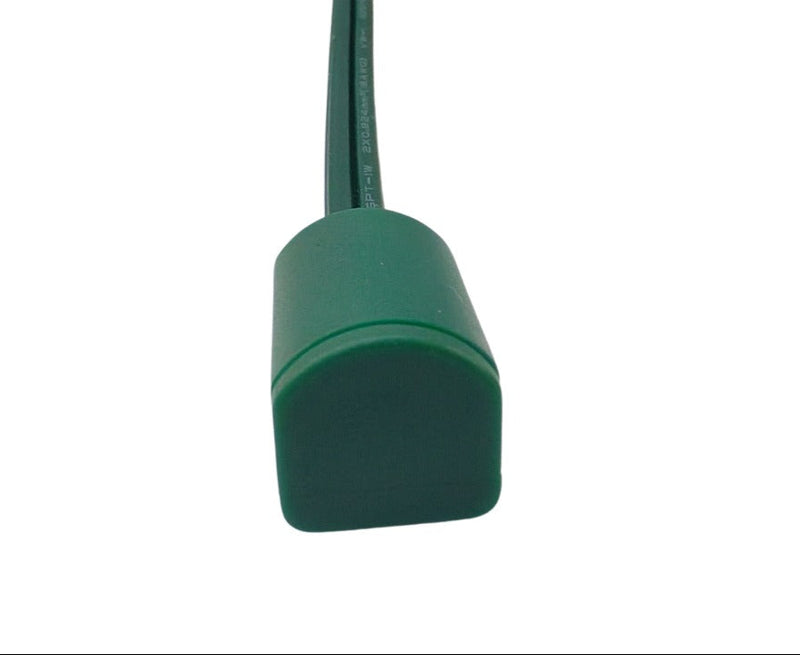 End view of green SPT-1 cord cap for light strand ends – 100-pack